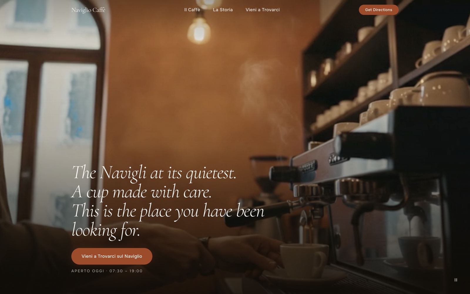 Naviglio Caffè website hero — headline "The Navigli at its quietest. A cup made with care." over a warm café interior on the canal.